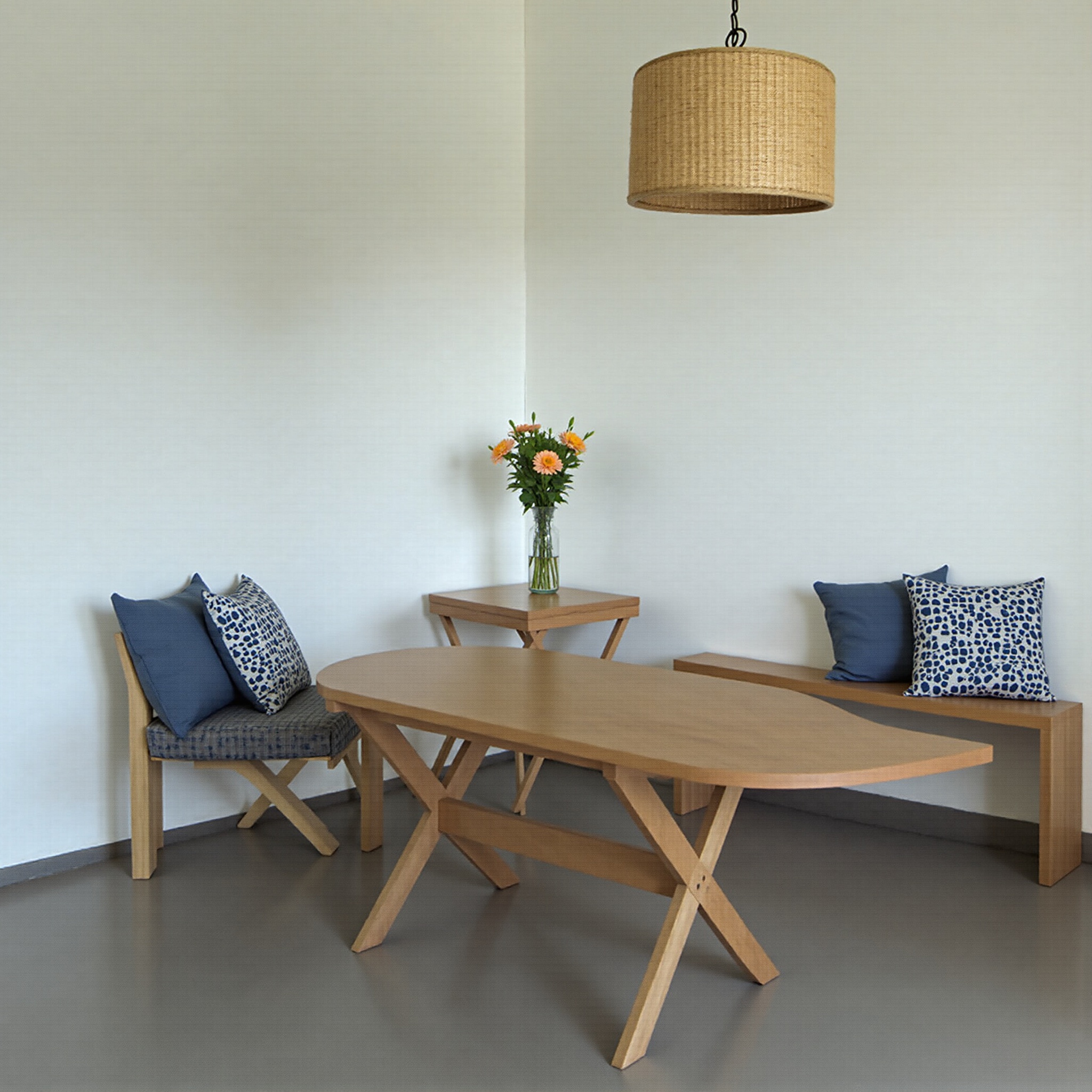 AI generated image by FLUX.1-image-to-image: ponle cojines a bancos y sillas, crea un rincon que trasmita calma, que sea natural y utiliza colores complementarios al azul. la mesa dejala de color madera